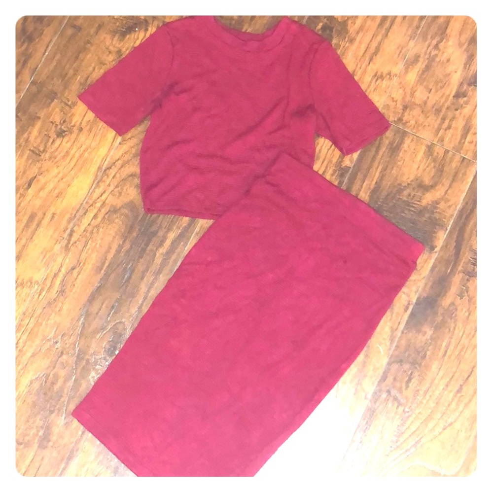 2 piece. Size small. tight skirt &top. shows belly